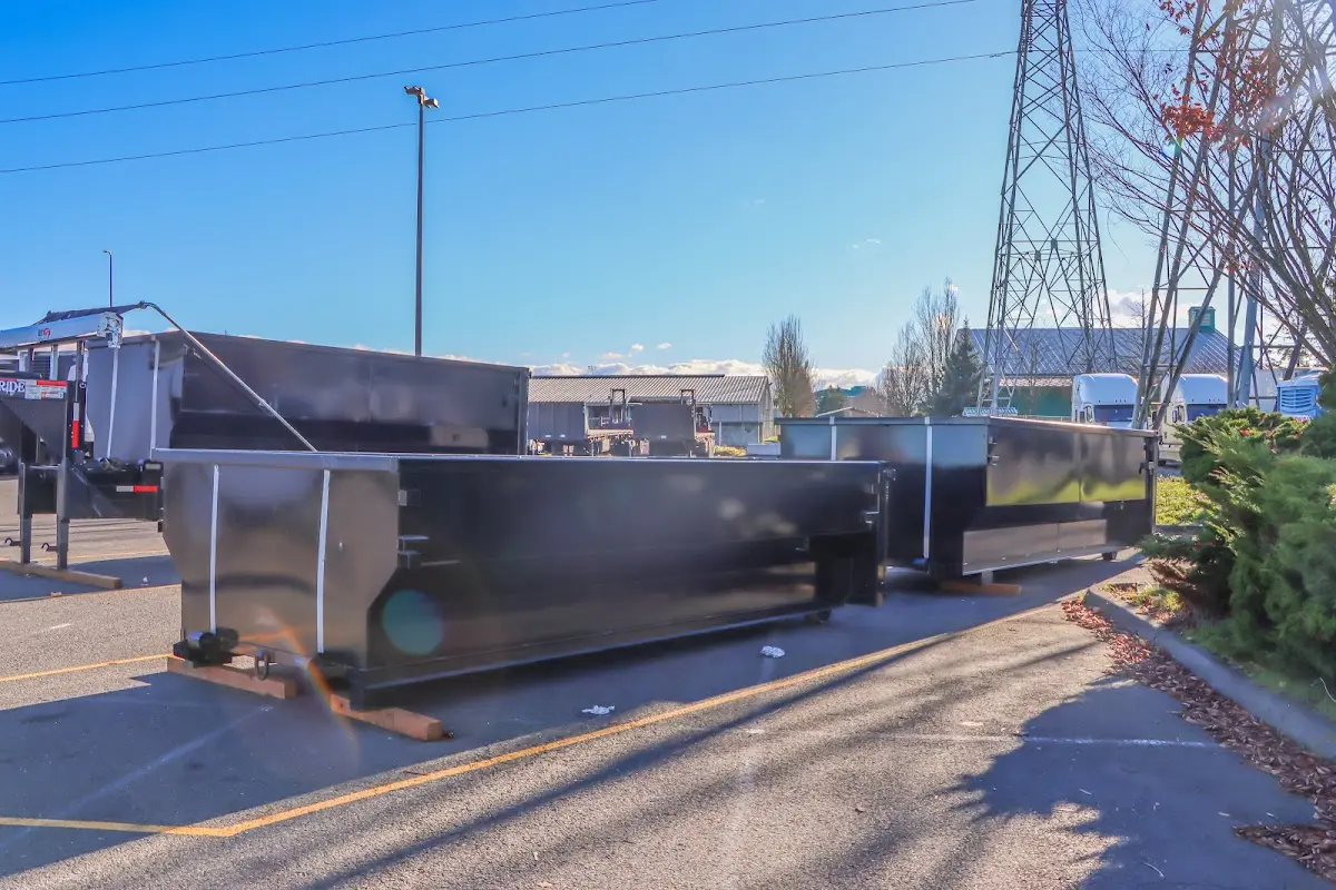 Roll-off dumpster ready for waste disposal at job site for 6 Yard Dumpster Rental in Waupun